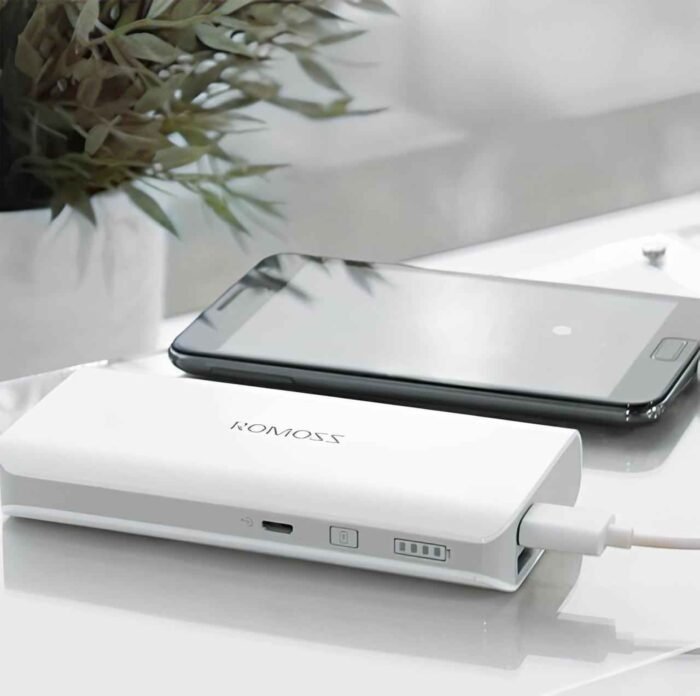 ROMOSS Sense 4 power bank White with mobile.jpg